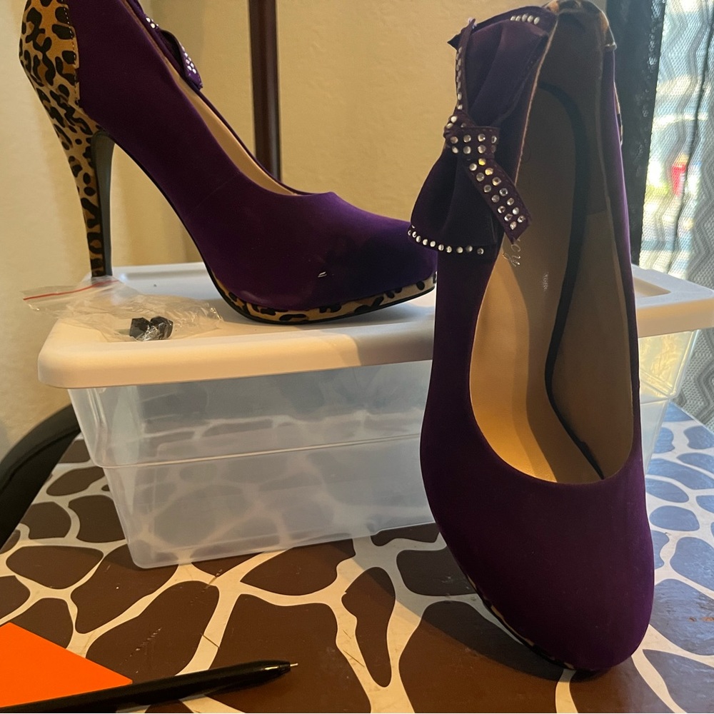 Purple cheetah heels.